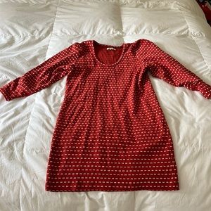 Red(ish) orange long sleeve dress. Slight balloon sleeve.